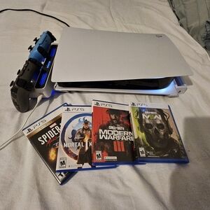 Sony PlayStation 5 with Blue and Black Controller